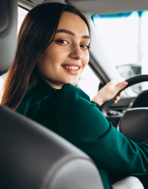 Driving instructor teaching a student